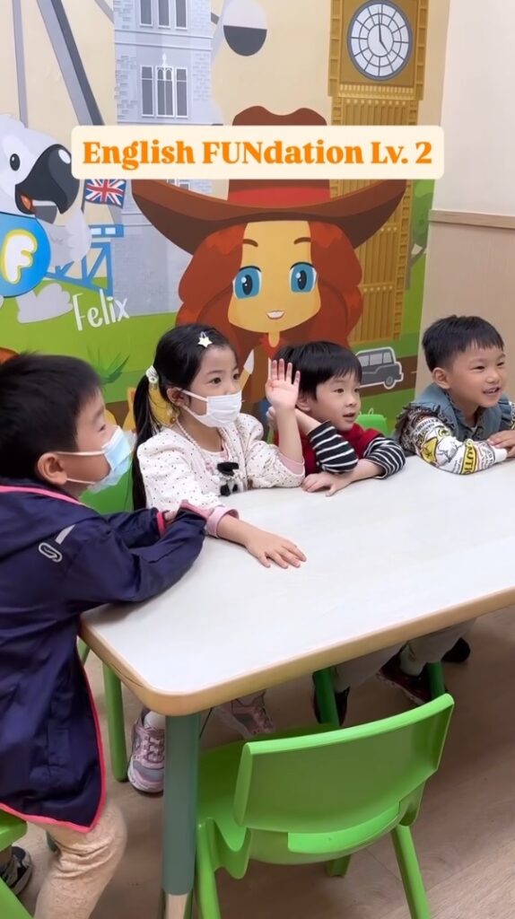Sheung Shui Classroom Moments: English FUNdation Level 2 (K1–K3)|Joyful, Structured, and Confidence‑Building 1 Children clapping and smiling during a “Can you…?” action game in Sheung Shui.